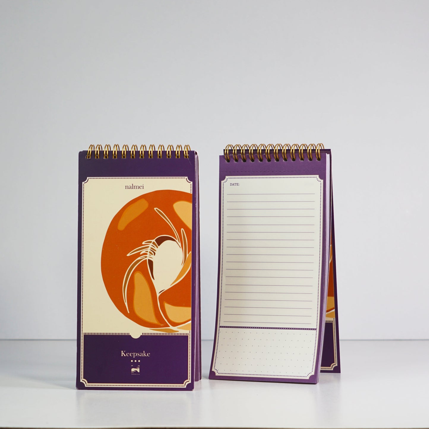 An aesthetic picture of Purple Tear Away Notepad showing the inside and front of the book | Nalmei
