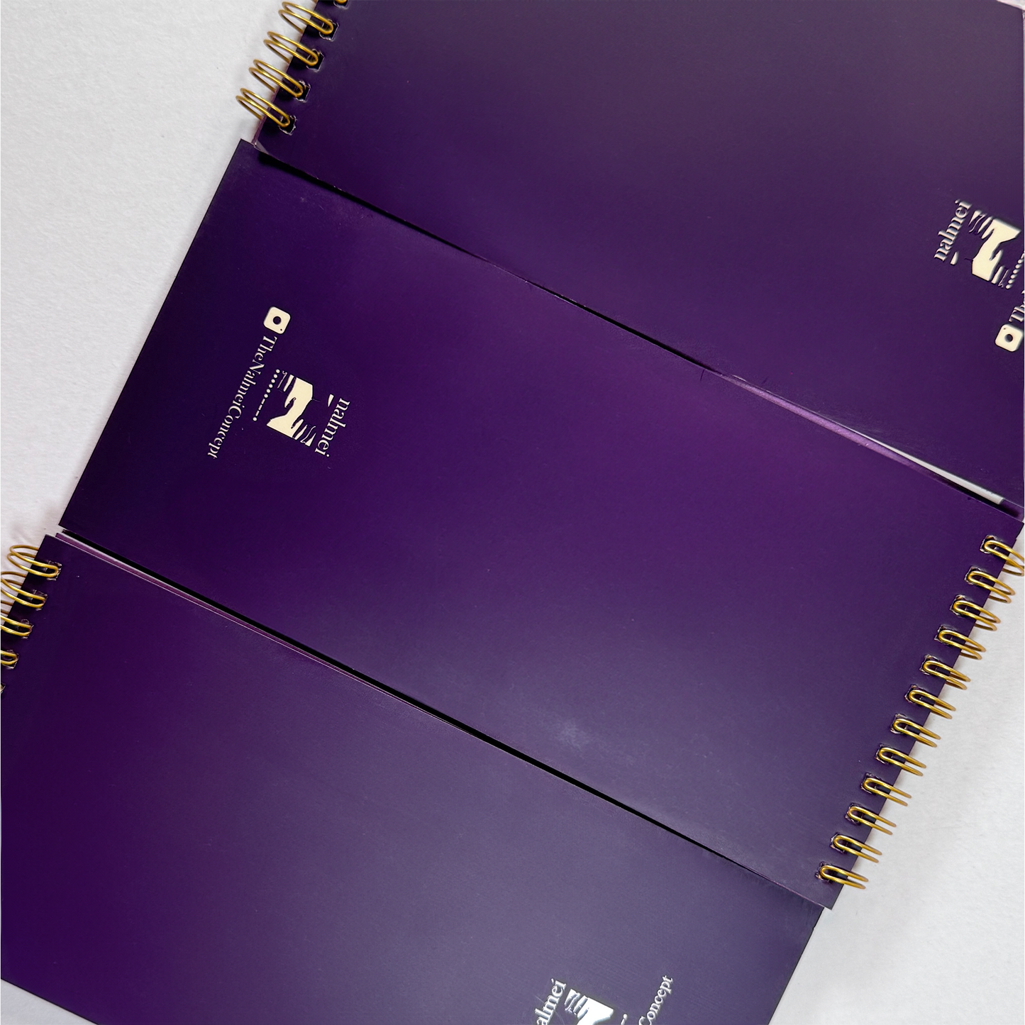 An aesthetic picture of Purple Tear Away Notepad showing the back of the book | Nalmei