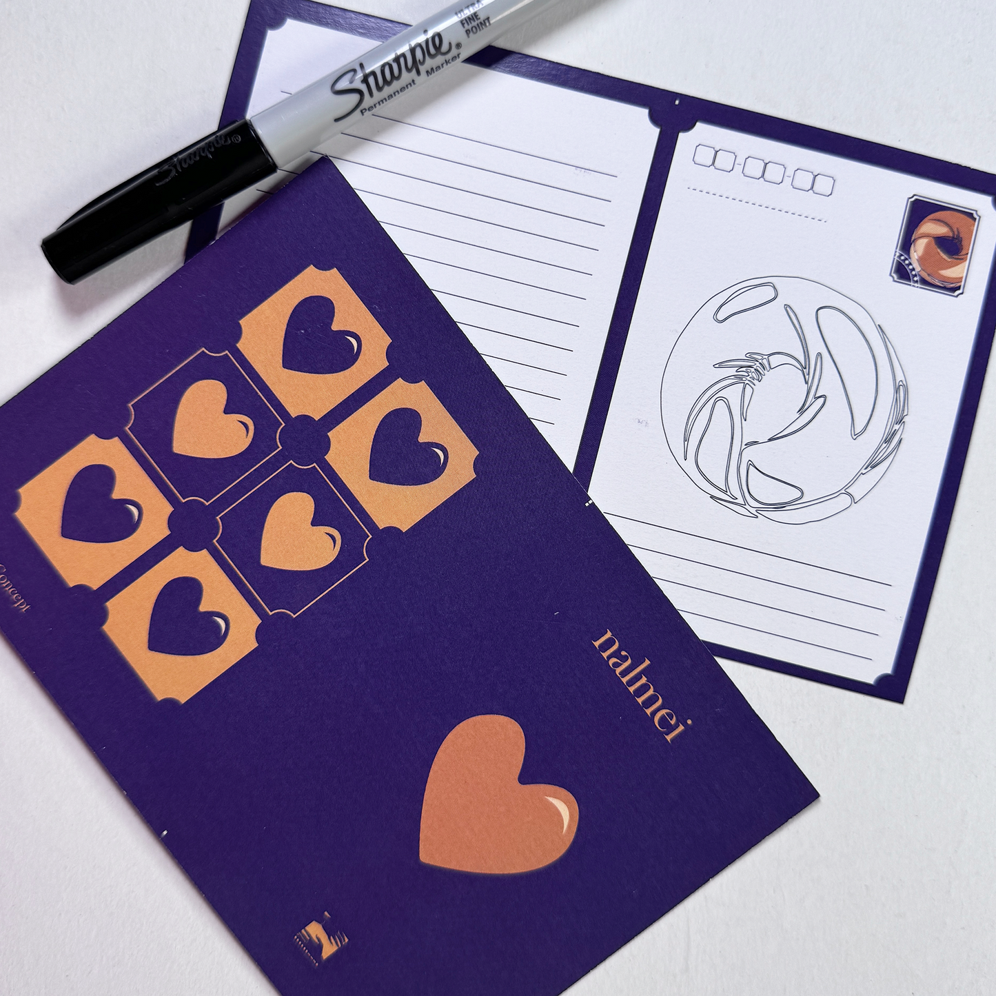 Purple Postcard showing front and back with a sharpie | Nalmei
