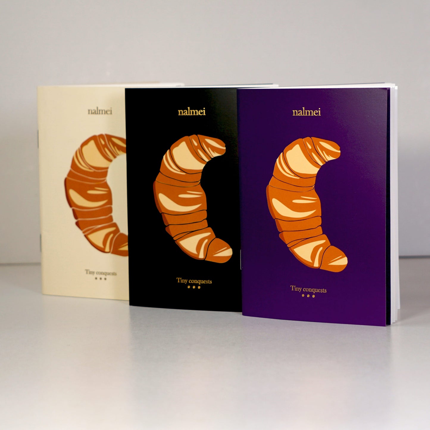 A set of 3 Croissant To-do List notebooks showcasing the gold foiling work on the front | Nalmei