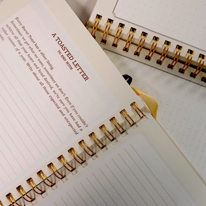 Insides of the beige activity Journal showing a page 'a toasted letter to begin with' | Nalmei