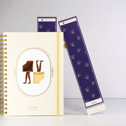 A purple and beige large bookmark with pretzel illustrations leaning on a quotes journal | Nalmei